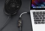 TempoTec Sonata BHD Pro posé sur un bureau avec ordinateur et casque audio