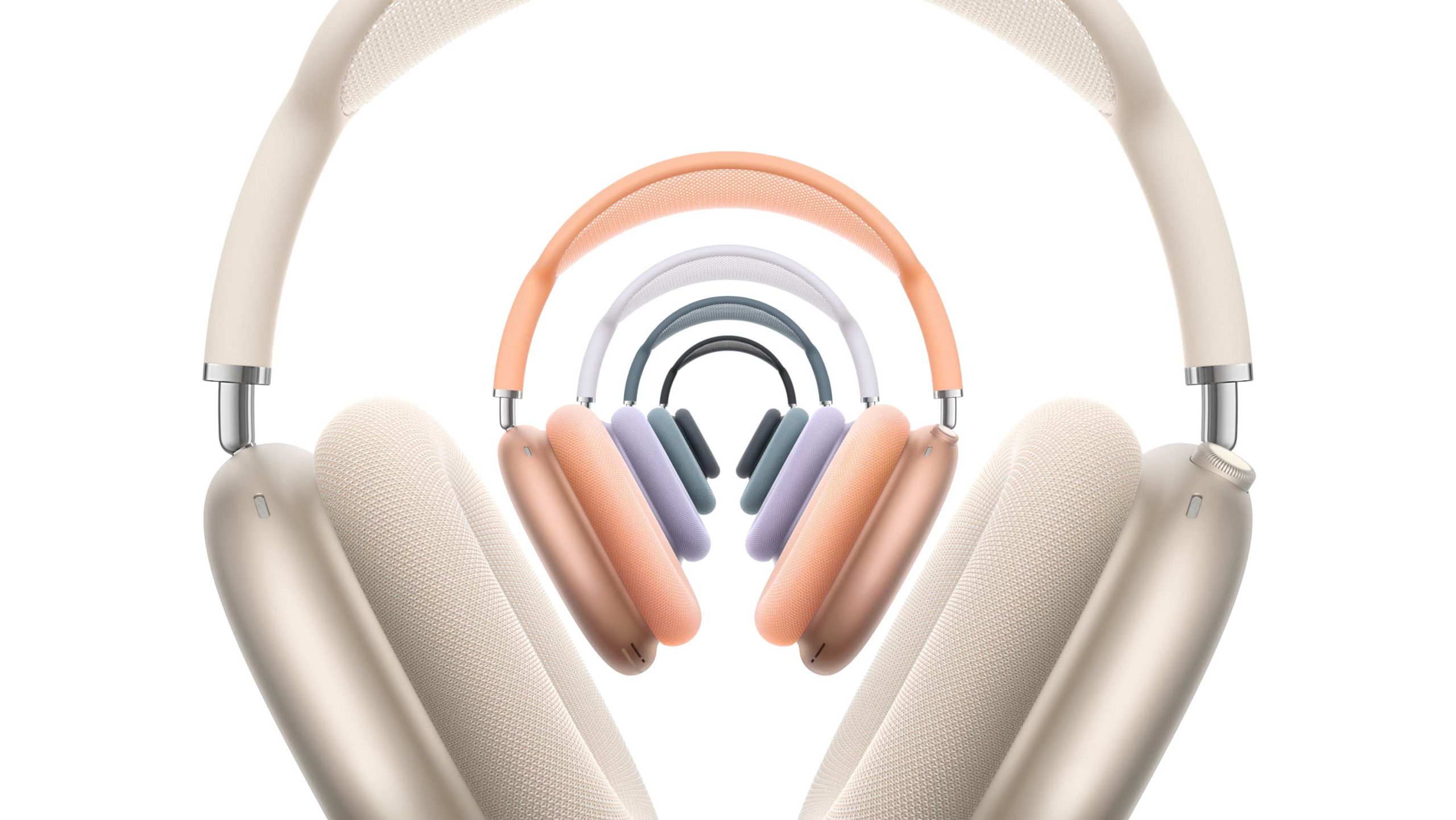 Vue en tunnel artistique présentant les différentes déclinaisons de couleurs des AirPods Max 2, incluant les finitions minuit, lumière stellaire, bleu, orange et violet sur fond blanc.
