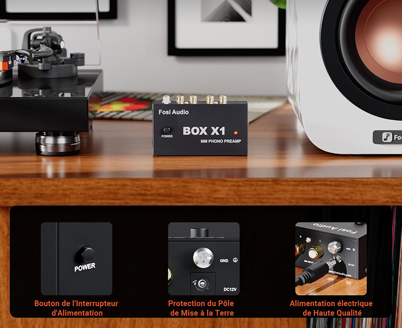 Le préampli phono Fosi Audio BOX X1 est utilisé avec une platine vinyle en fonctionnement.