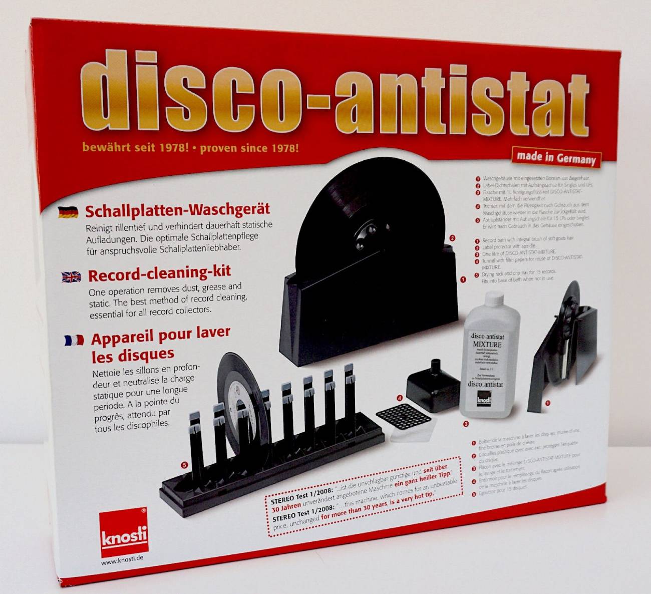Boîte d'emballage du Knosti Disco-Antistat montrant les instructions en français, allemand et anglais, mettant en avant la fabrication allemande et l'efficacité antistatique depuis 1978.
