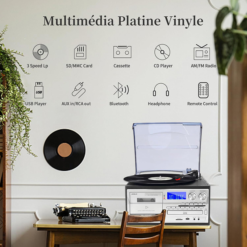 Une personne utilise la platine vinyle 9-en-1 Jorlau pour écouter de la musique dans un environnement confortable.