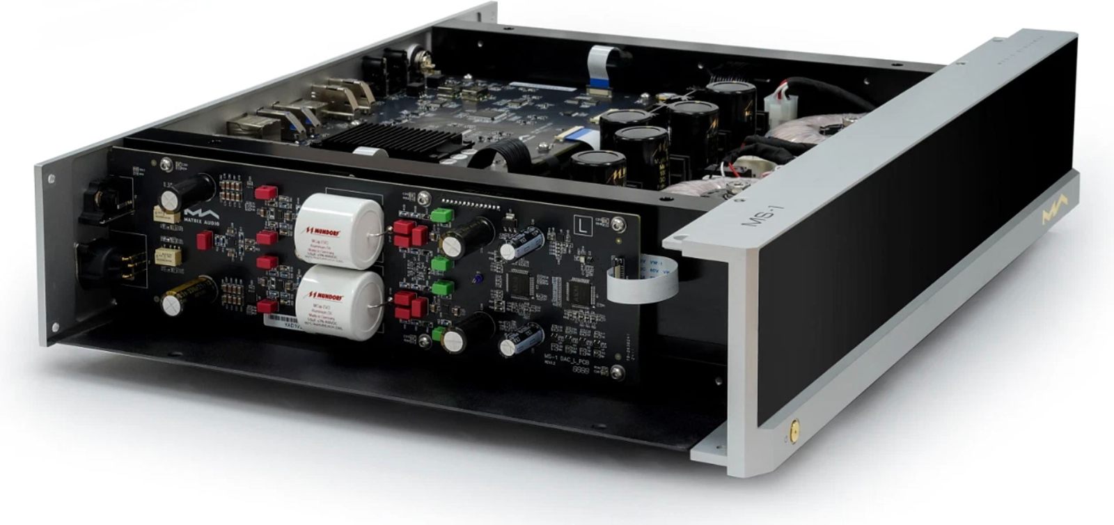 Vue éclatée de l'intérieur du streamer-DAC Matrix Audio MS-1c dévoilant les circuits imprimés, les condensateurs Mundorf et l'architecture haut de gamme Velvet Sound d'AKM.