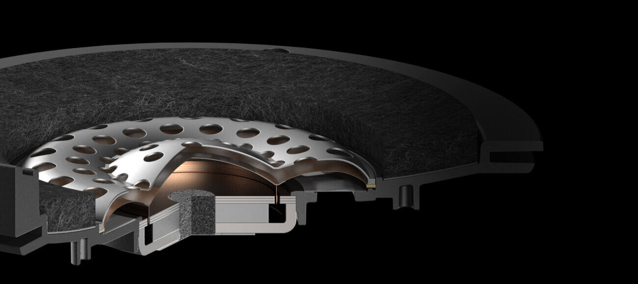 Vue en coupe du transducteur dynamique de 58 mm du casque Audio-Technica ATH-AWX7000 : membrane hybride HMD à dôme métallique, circuit magnétique et coussinet