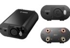 Adaptateur FiiO IMP XLR-4 noir en aluminium vu de trois quarts, face avant avec prises casque 4,4 mm et XLR 4 broches, face arrière avec quatre borniers R+ R- L+ L-
