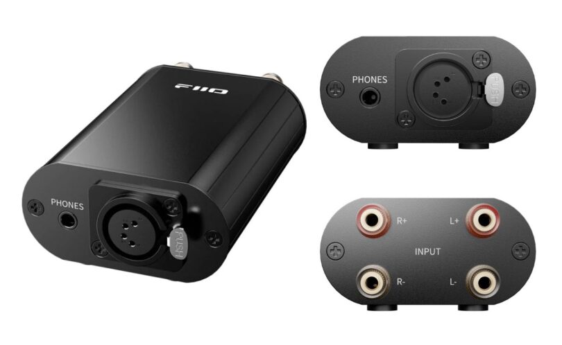 Adaptateur FiiO IMP XLR-4 noir en aluminium vu de trois quarts, face avant avec prises casque 4,4 mm et XLR 4 broches, face arrière avec quatre borniers R+ R- L+ L-