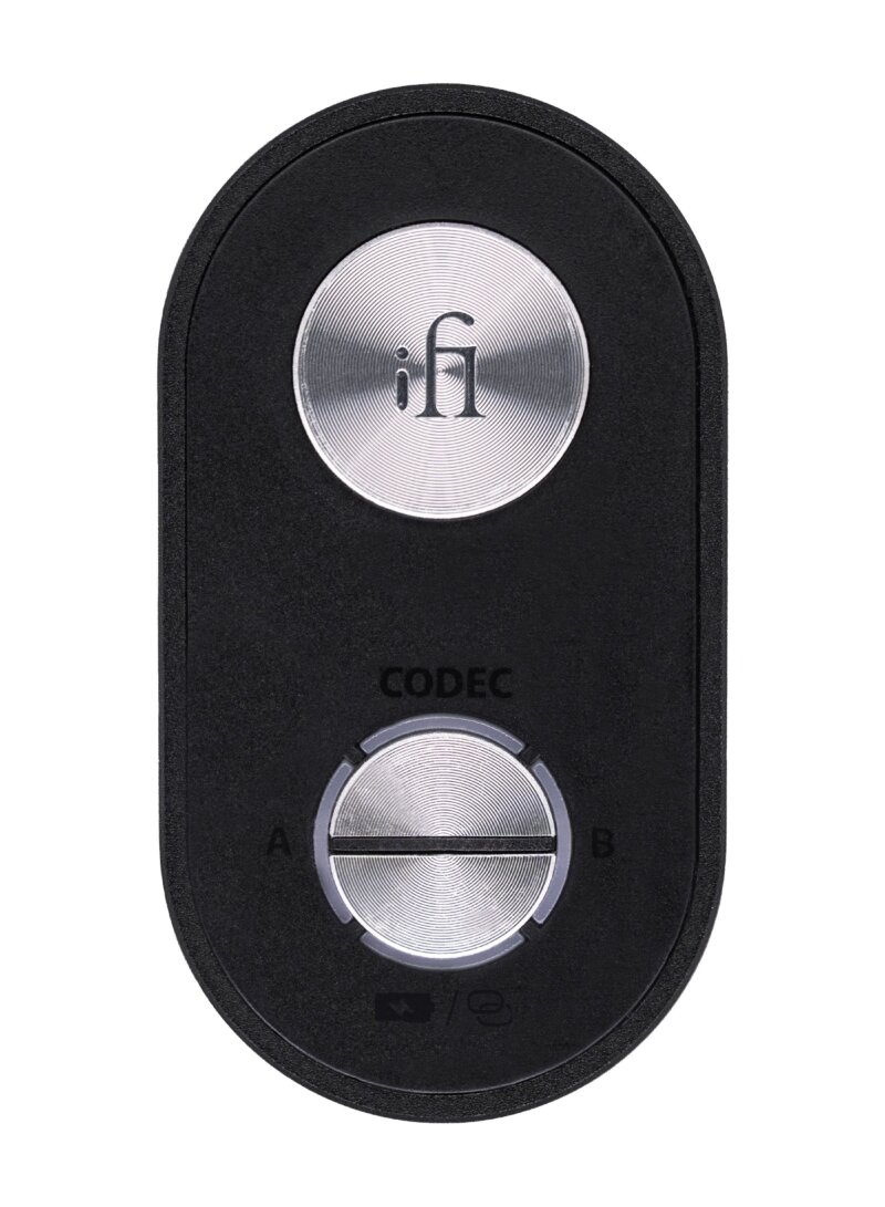 iFi UP Travel Max vu de dessus, bouton d'alimentation iFi en aluminium et bouton CODEC avec positions A et B sur boîtier noir ovale