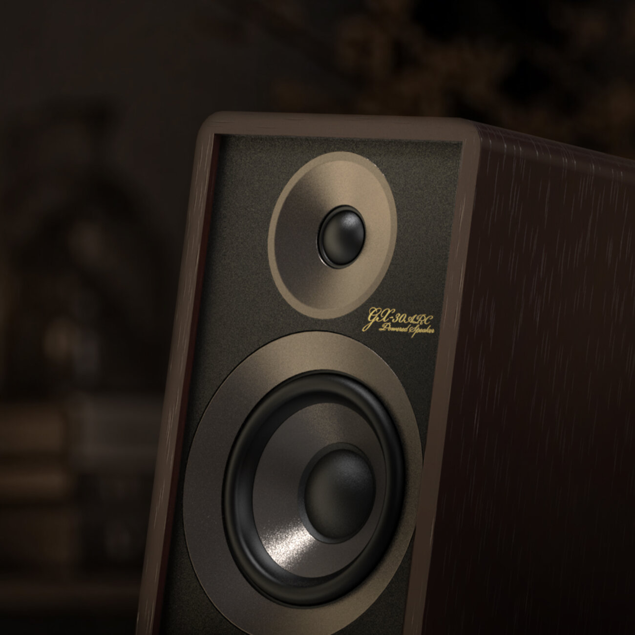 Gros plan officiel sur la façade de l'Onkyo GX-30ARC édition 80 ans : tweeter à dôme et woofer cerclés de gris foncé sur façade noire texturée, flanc en noyer Bordeaux