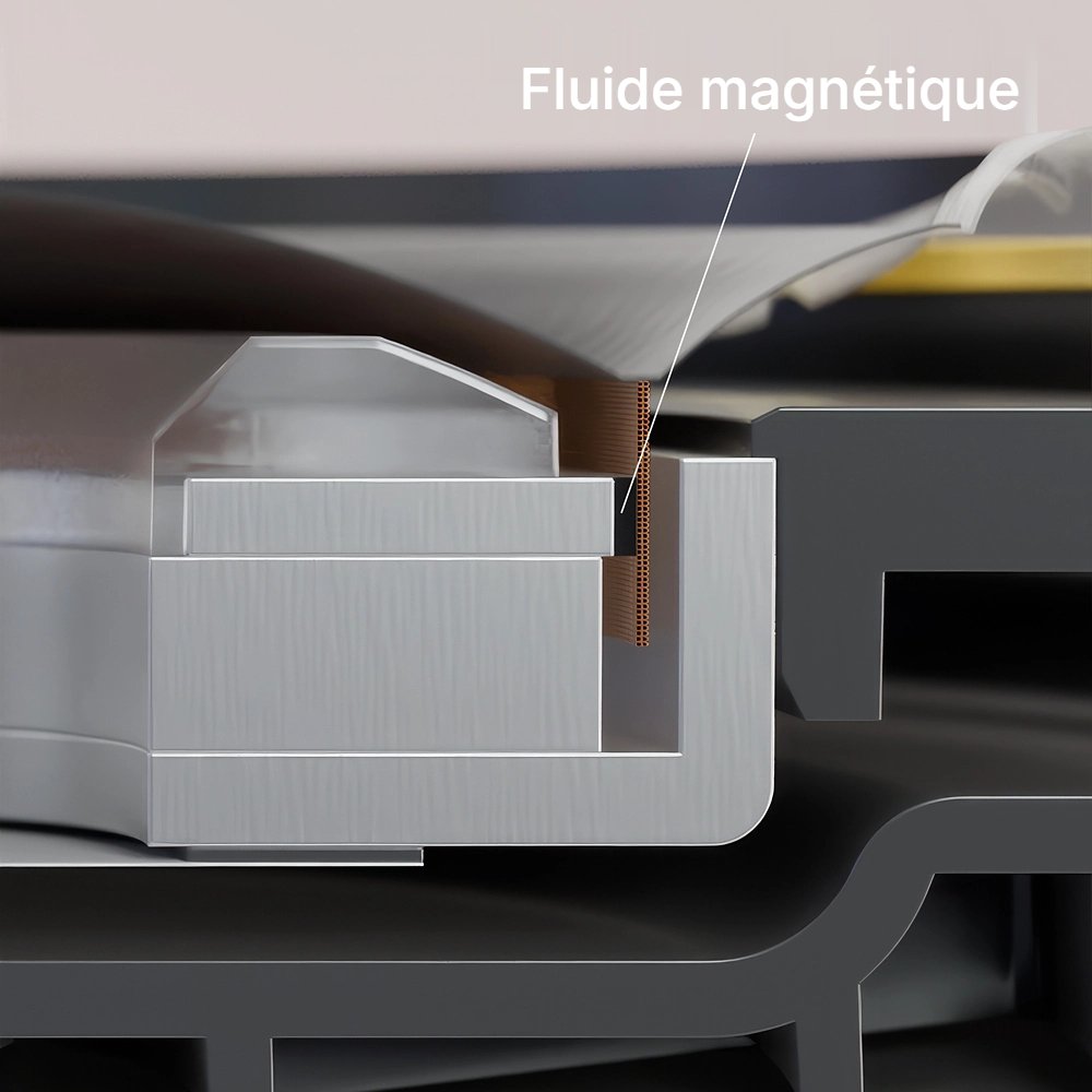 Coupe du moteur du haut-parleur Technics EAH-A1000 montrant le fluide magnétique placé dans l'entrefer entre la bobine mobile et l'aimant